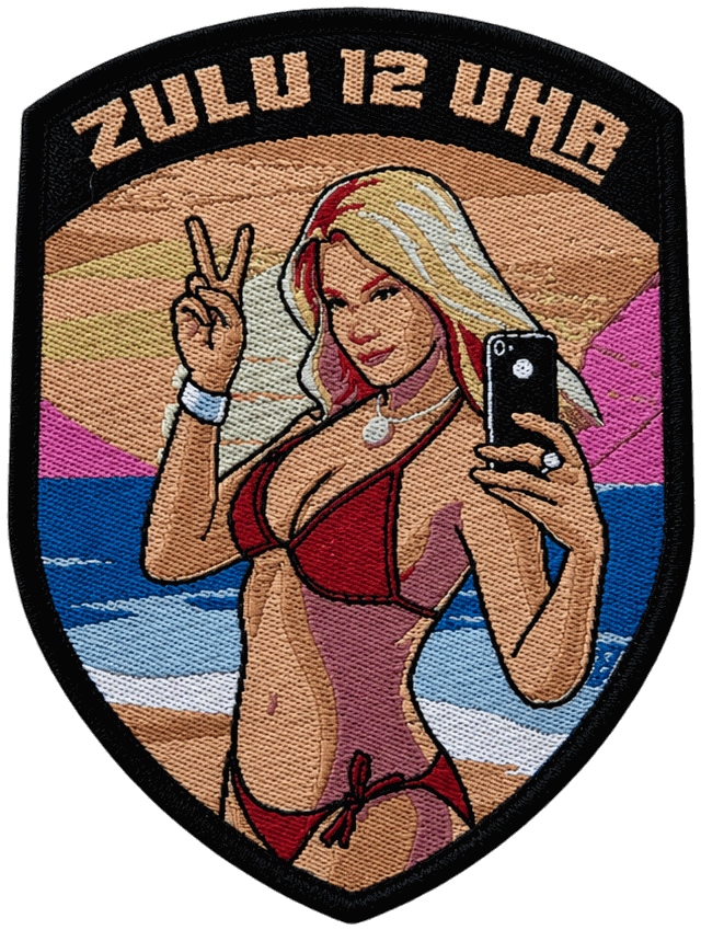 MatMag Badge — Zulu 12 Uhr